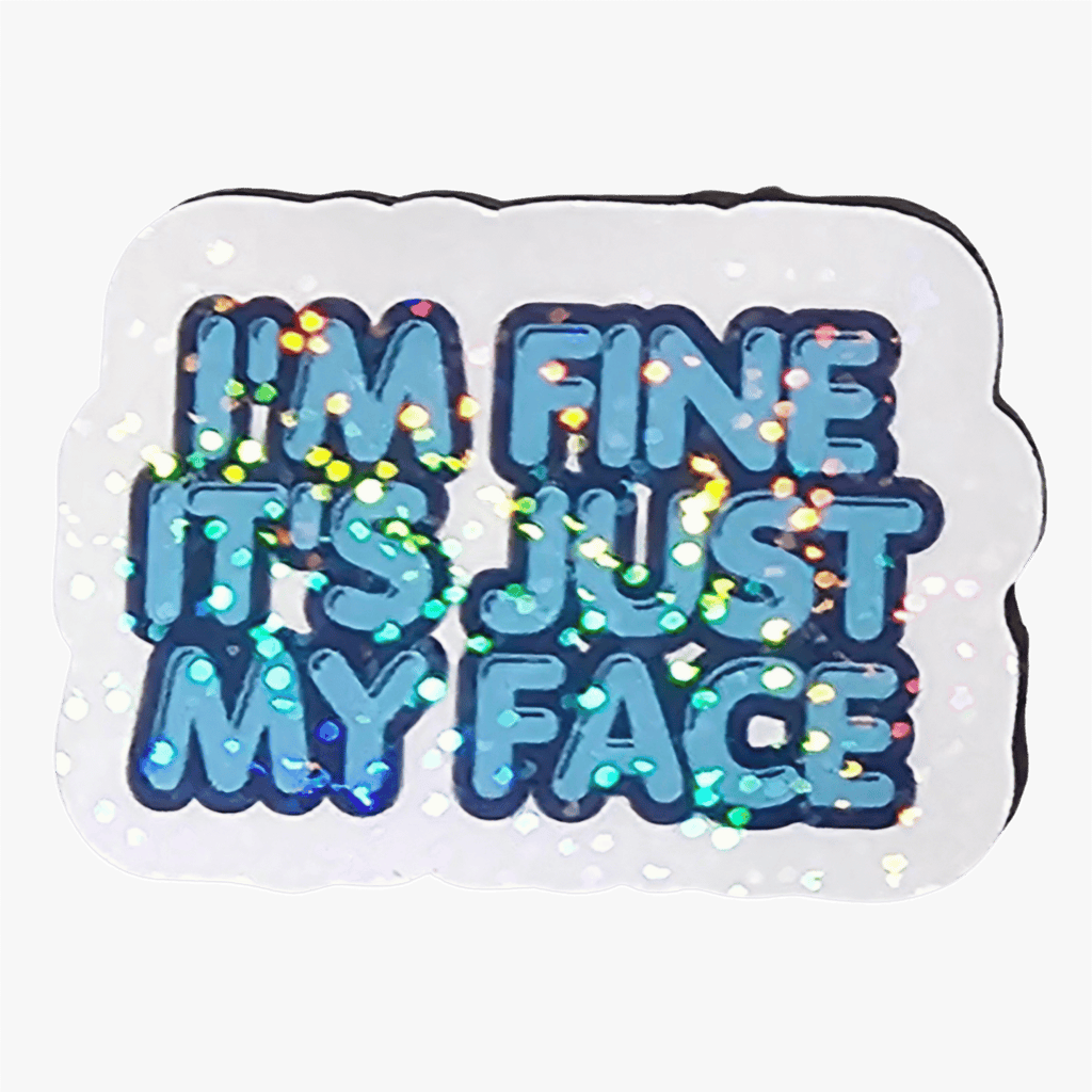 Sticker with text 'I'm fine it's just my face' on a dark background