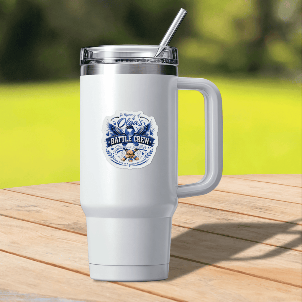 White insulated tumbler with a blue memorial sticker reading In Memory Of Olga's Battle Crew.