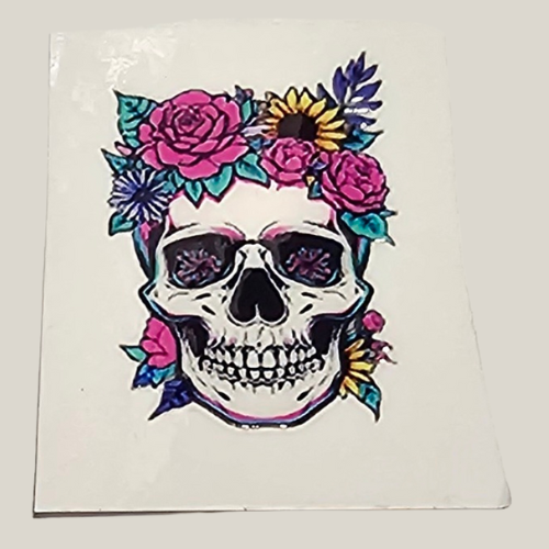 Skull with floral decorations on a white background