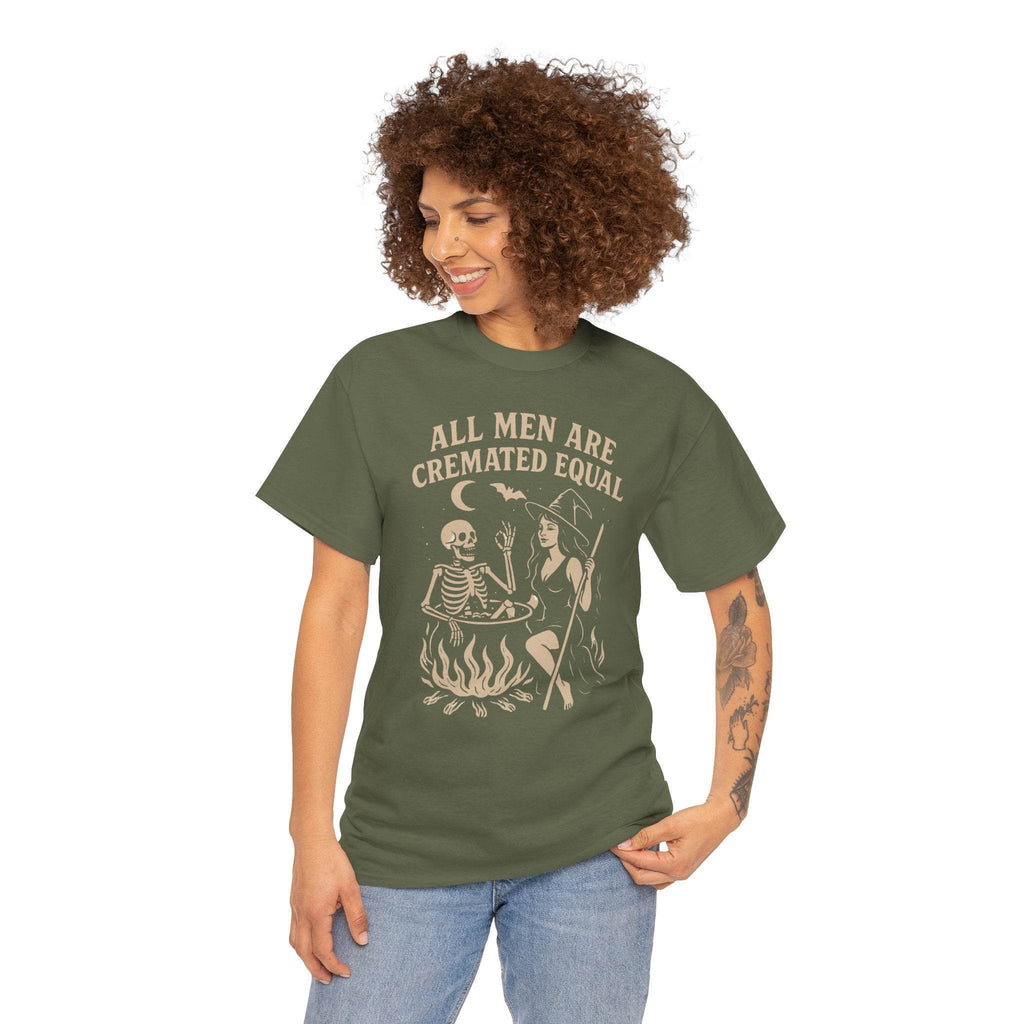 Woman wearing olive green t-shirt with witch cauldron scene and the bold slogan All Men Are Cremated Equal.