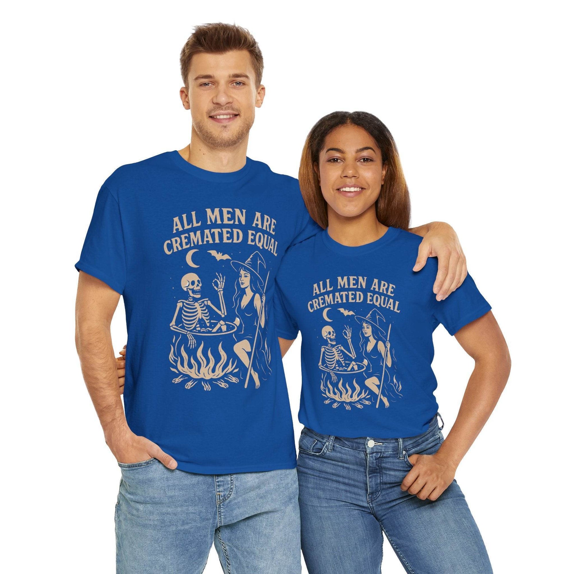 Two people wearing blue All Men Are Cremated Equal witch cauldron Halloween tees on Gildan 5000.